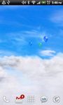Immagine 3 di Sfondo animato Cieli blu grat.